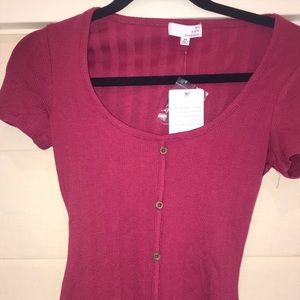 Pink colored ribbed dress